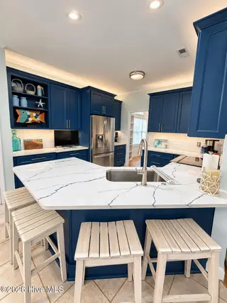 301 Wisteria Way, Caswell Beach, NC 28465 – photo 7: Kitchen