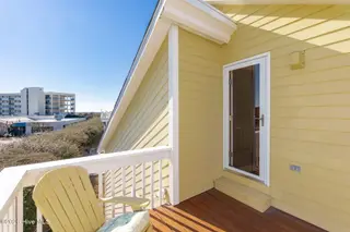 117 Island Quay Court, Atlantic Beach, NC 28512 – photo 19: Primary Bedroom deck access