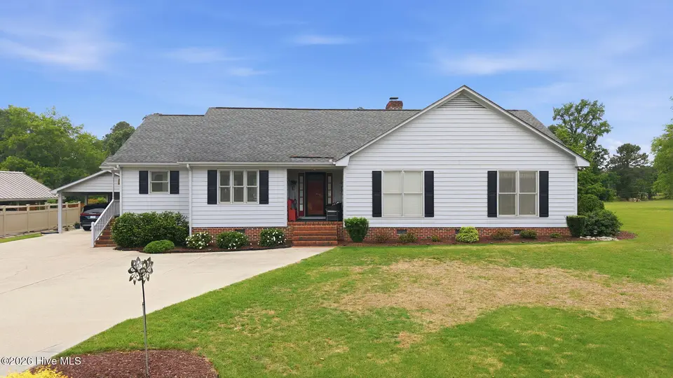 7790 S Old Carriage Road, Rocky Mount, NC 27803 – photo 1 of 51: 1-web-or-mls-DJI_20260511094842_0302_D