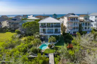 1207 S Topsail Drive, Surf City, NC 28445 – photo 1: DJI_20260520015556_0259_D copy