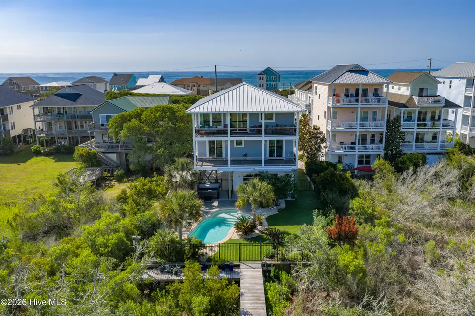 1207 S Topsail Drive, Surf City, NC 28445 – photo 1 of 70: DJI_20260520015556_0259_D copy