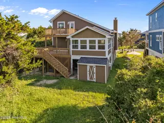 312 E Dolphin Drive, Oak Island, NC 28465 – photo 3: 3-web-or-mls-DJI_20250826170923_0124_D