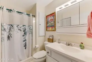 2903 E Oak Island Drive, Oak Island, NC 28465 – photo 14: Hall bath