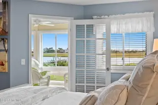 1916 Inlet Village Circle SW Unit 3a, Ocean Isle Beach, NC 28469 — 2-bedroom condo in Inlet Wacche, Ocean Isle Beach, NC, photo 17 of 38: Primary bedroom