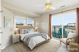 1426 N New River Drive, Surf City, NC 28445 – photo 15: Upstairs Bedroom Virtually Staged