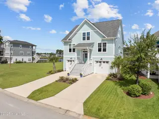 361 Summerhouse Drive, Holly Ridge, NC 28445 – photo 1: 3-web-or-mls-DJI_20250826150313_0643_D