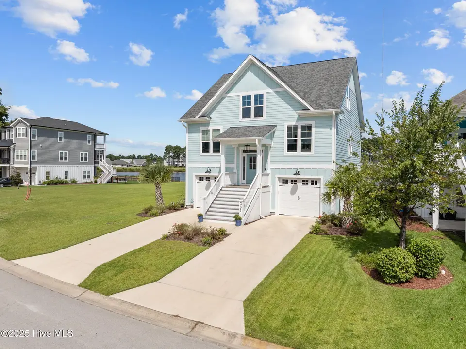 361 Summerhouse Drive, Holly Ridge, NC 28445 – photo 1 of 73: 3-web-or-mls-DJI_20250826150313_0643_D