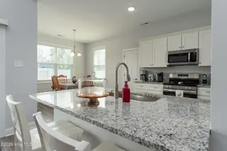 610 Bright Harvest Drive, Maysville, NC 28555 – photo 11: Breakfast Bar in Kitchen