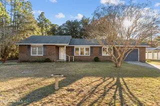 566 Palmer Drive, Southport, NC 28461 — 3-bedroom home in Boiling Spring Lakes, Southport, NC, photo 1 of 54: Front