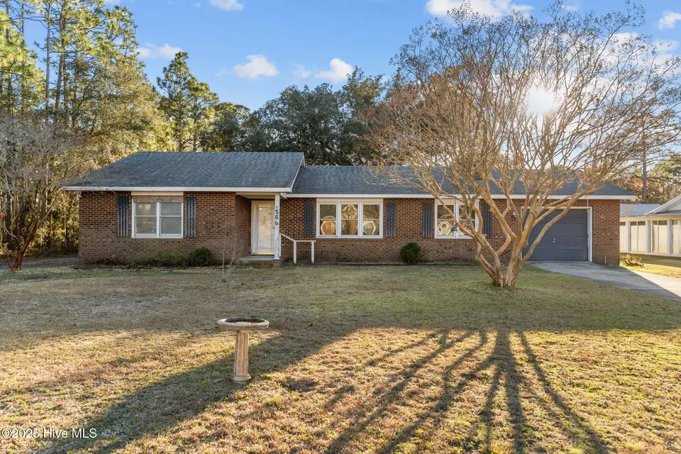 566 Palmer Drive, Southport, NC 28461 — 3-bedroom home in Boiling Spring Lakes, Southport, NC, photo 1 of 54: Front