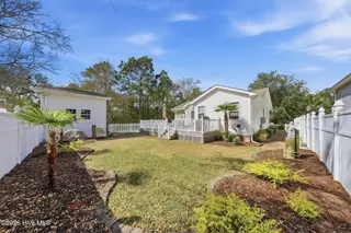 142 NW 8th Street, Oak Island, NC 28465 – photo 7: 142NWEighthSt-41