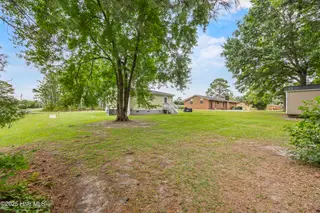 141 Hargrove Drive, Wilmington, NC 28411 — 2-bedroom home in Weaver Acres, Wilmington, NC, photo 20 of 32: 29_back exterior