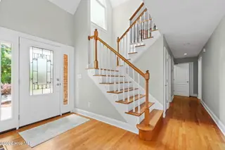1714 Oakbrook Drive SW, Ocean Isle Beach, NC 28469 – photo 19: Stair landing