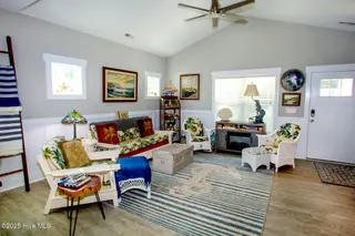 218 NE 67th Street, Oak Island, NC 28465 – photo 5: living room 3