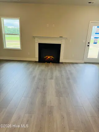 409 S Carey Street Lot 66, La Grange, NC 28551 – photo 7: fireplace in living room
