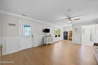 104 SW Yacht Drive, Oak Island, NC 28465 — 5-bedroom waterfront home, Oak Island, NC, photo 13 of 77: Flex living area