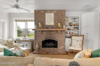 2108 Shepard Street, Morehead City, NC 28557 – photo 13: Stunning brick fireplace in living room