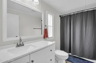 2216 Bell Williams Road, Burgaw, NC 28425 — 3-bedroom manufactured home, Burgaw, NC, photo 10 of 25: Primary Bathroom – Bright and Function