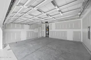 79 W Farley Drive 80, Hampstead, NC 28443 — 4-bedroom home in Brookfield Branch, Hampstead, NC, photo 22 of 48: 43_garage