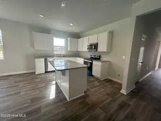 560 Coronado Avenue SE 14, Leland, NC 28451 – photo 8: Kitchen Area with Island