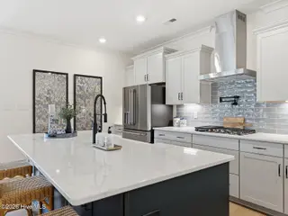 9251 Salty Breeze Place, Leland, NC 28451 — 5-bedroom home in Grand Park, Leland, NC, photo 15 of 42: Kitchen