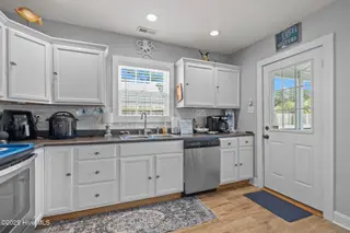3111 Arendell Street, Morehead City, NC 28557 – photo 13: Kitchen to Screened Porch