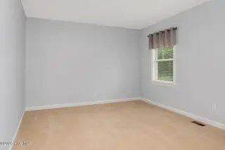 1020 Ridgemeadow Lane, Rocky Mount, NC 27803 – photo 21: Downstairs Bedroom