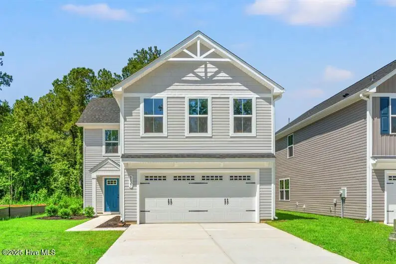 8027 Sterling Oaks Drive NW, Ash, NC 28420 – photo 1 of 17: Lily