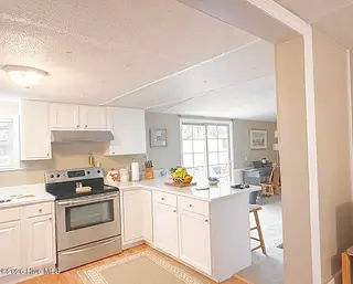 4905 Hunting Ridge Road NW, Wilson, NC 27896 — 3-bedroom manufactured home in Windemere, Wilson, NC, photo 4 of 16: Kitchen