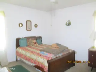 7625 Wheat Swamp Road, Lucama, NC 27851 – photo 6: 7625 Wheat Swamp bdrm1-2
