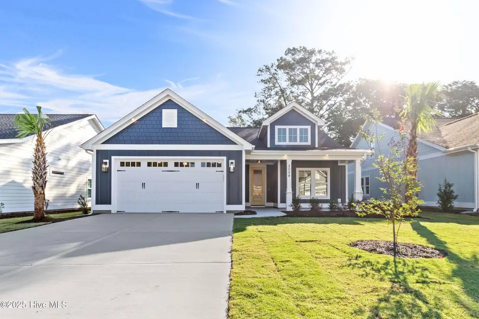2054 Greenside Manor Drive SW, Ocean Isle Beach, NC 28469 – photo 1 of 50: 2054 Greenside Manor