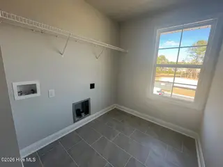 3002 Old Berwick Street SW, Shallotte, NC 28470 — 5-bedroom home in Rutledge, Shallotte, NC, photo 7 of 45: Laundry Room