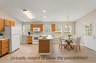 2311 E Boiling Spring Road, Southport, NC 28461 — 3-bedroom home in Boiling Spring Lakes, Southport, NC, photo 5 of 45: Photo kitchen-DR