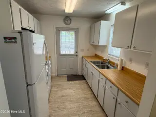 128 NW 12th Street, Oak Island, NC 28465 – photo 3: IMG_3056