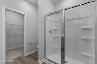 786 Palm Frond Way NW, Calabash, NC 28467 – photo 18: primary shower into closet