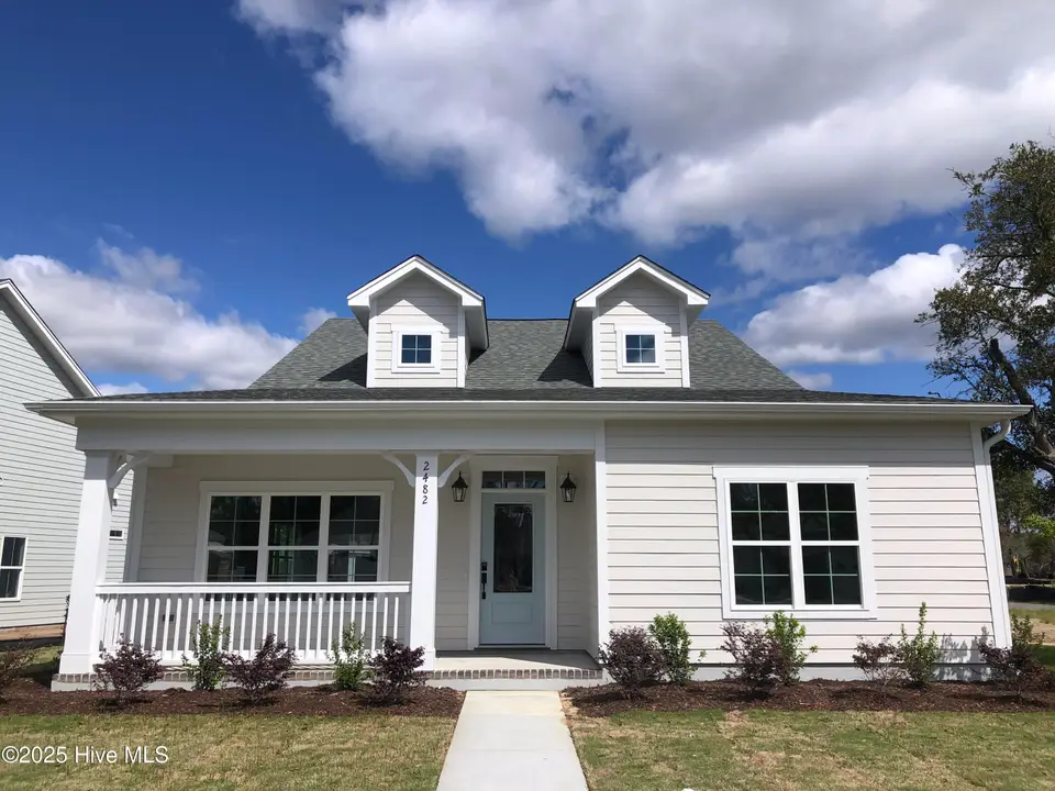 2482 Lake Ridge Drive, Southport, NC 28461 – photo 1 of 25: Front of Home