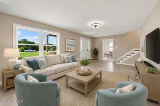 377 Diamond City Drive, Harkers Island, NC 28531 – photo 5: Living Room w Barrel Chairs