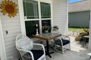 218 NE 67th Street, Oak Island, NC 28465 – photo 2: FRONT PORCH 218