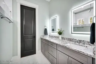 9599 Fallen Pear Lane NE, Leland, NC 28451 – photo 24: Primary en suite bathroom