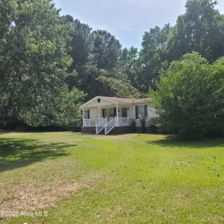 107 Eagle Ridge Drive, Dudley, NC 28333 — 4-bedroom manufactured home in Eagle Ridge, Dudley, NC, photo 3 of 17: Front 2