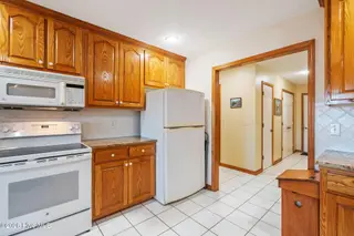 1461 S Shore Drive, Southport, NC 28461 – photo 24: Stove & Frigerator