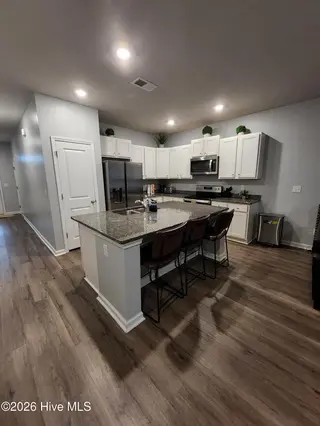 7691 Knightbell Circle 10, Leland, NC 28451 – photo 4: 20250728_192153