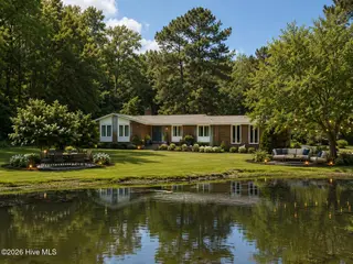 4396 James B White Highway S, Whiteville, NC 28472 – photo 3: Just a little landscaping touchup