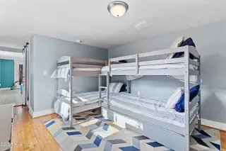 424 Keziah Street, Oak Island, NC 28465 – photo 17: 24_bedroom
