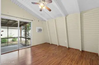 327 NE 54th Street, Oak Island, NC 28465 – photo 20: 21_bedroom