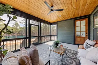 2841 Murdocksville Road, West End, NC 27376 – photo 4: Screened Porch Overlooking Pond