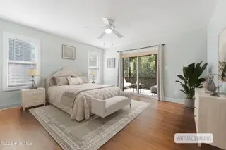 106 Wyndward Court, Emerald Isle, NC 28594 – photo 24: Primary suite with screened porch