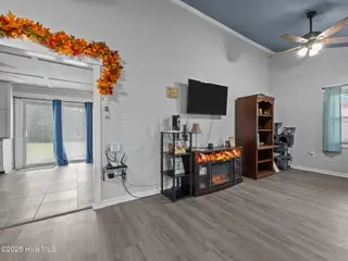 87 Crown Point Road, Hubert, NC 28539 – photo 6: Living Room to Kitchen