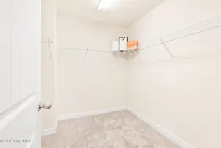 128 Wembley Drive, Clayton, NC 27527 – photo 13: primary closet