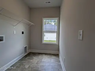 511 Sweet Potato Lane Lot 10, Nashville, NC 27856 – photo 15: laundry room 1